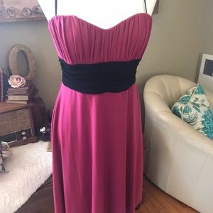Pink and black empire waist cocktail dress.